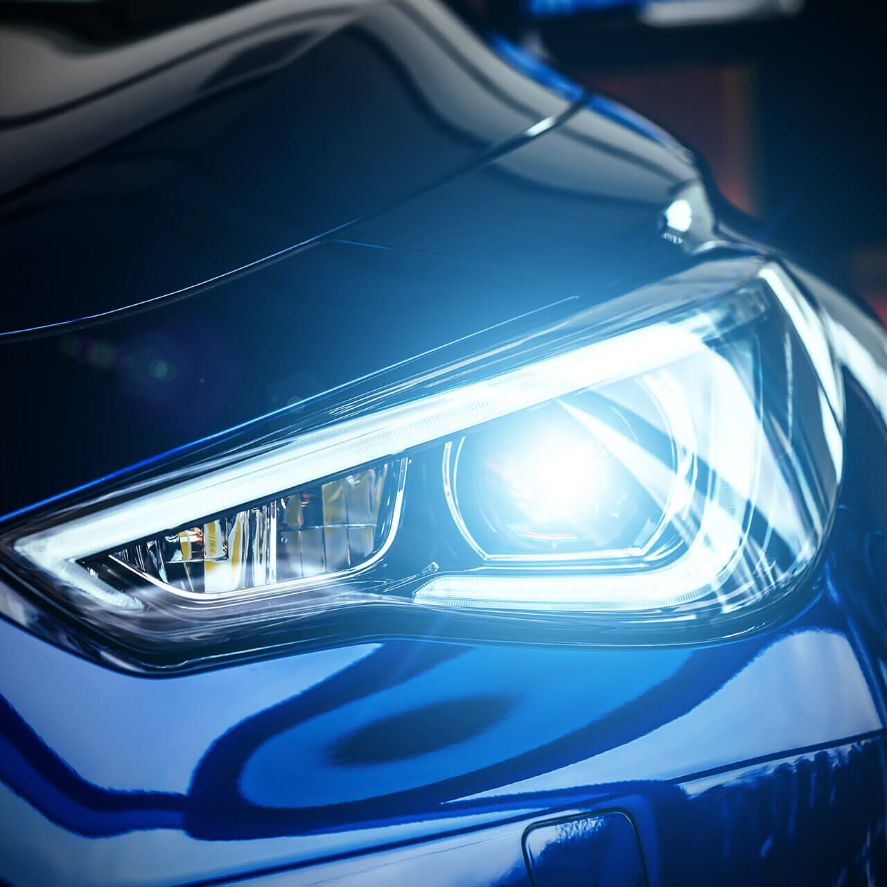 Macro view of modern blue car xenon lamp headlight